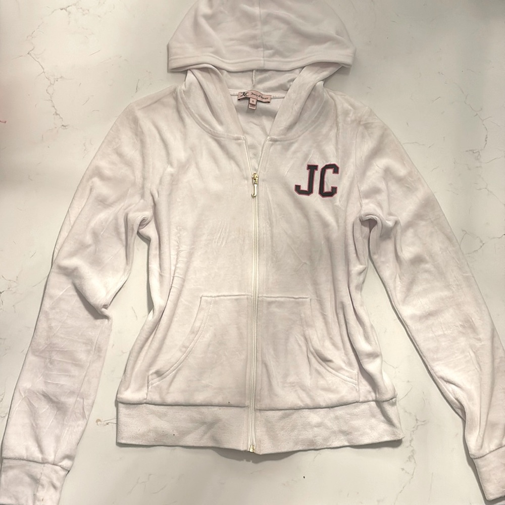 Juicy Couture—
White velvet tracksuit jacket w/ black and pink printed logo